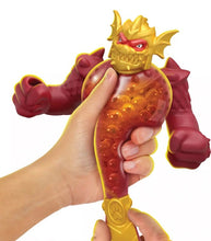 Load image into Gallery viewer, Goo Jit Zu Stretch Strikers - Blazagon being stretched in hand, showcasing unique gooey filling.