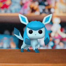 Load image into Gallery viewer, Glaceon Pokemon POP! Vinyl Figure with icy blue design displayed on a shelf.