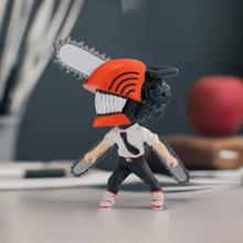 Load image into Gallery viewer, Chibi Masters Chainsaw Man figure with chainsaw head and dynamic pose.
