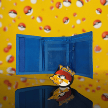 Load image into Gallery viewer, Pokemon Tri-fold Pikachu Lightning Strike Wallet with blue interior and Pikachu tag on colorful Poké Ball background.