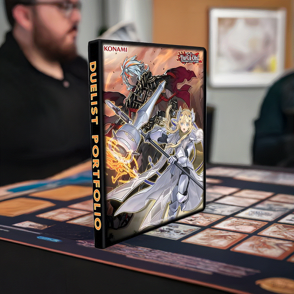 Yu-Gi-Oh! Albaz Ecclesia Tri-Brigade 9-Pocket Duelist Portfolio on table with game board.