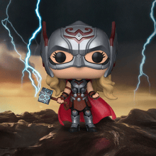 Load image into Gallery viewer, Marvel Thor Love & Thunder Mighty Thor Pop! Vinyl Figure with Mjolnir on rocky backdrop.