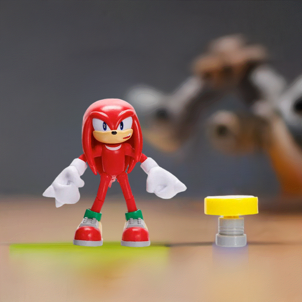 Knuckles figure with spring accessory from Sonic the Hedgehog series.