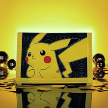 Load image into Gallery viewer, Pokemon Tri-fold Pikachu Wallet with Pikachu design on black background, multiple card slots, and bill compartment.