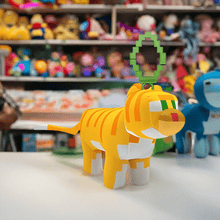 Load image into Gallery viewer, Minecraft 5 Inch Cat Bag Hanger Plush with pixelated design and clip-on feature on display.