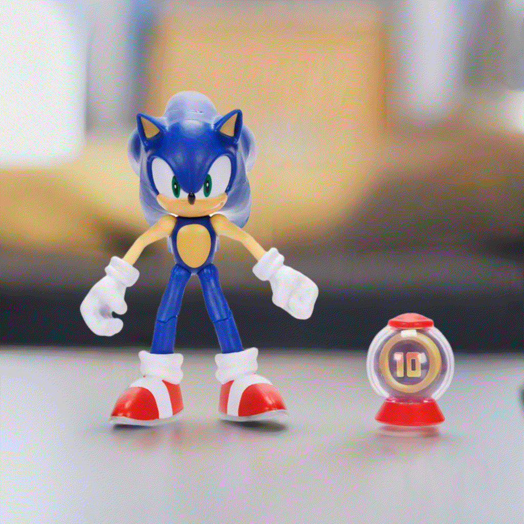 Sonic the Hedgehog figure with ring container on table.