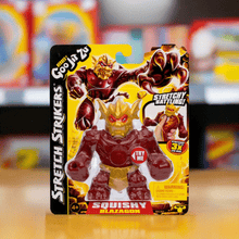 Load image into Gallery viewer, Heroes of Goo Jit Zu Stretch Strikers - Blazagon action figure in packaging.