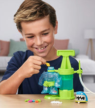 Load image into Gallery viewer, Child assembling Heroes of Goo Jit Zu Hero Creator Thrash with customization tools.