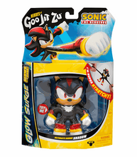Load image into Gallery viewer, Goo Jit Zu Sonic Glow Surge Shadow figure in packaging, featuring glow-in-the-dark stretchy toy.