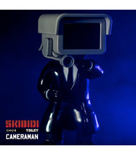 Load image into Gallery viewer, Skibidi Toilet Mystery Mini Figure Series 1 Cameraman collectible in dark setting.