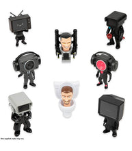 Load image into Gallery viewer, Skibidi Toilet Mystery Mini Figure Series 1 collection with 8 unique characters, including Cameraman and TV Man figures.