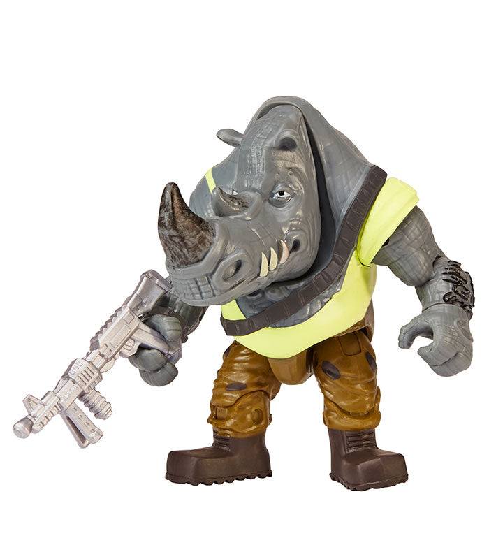 Teenage Mutant Ninja Turtles Movie Rocksteady action figure with blaster and weapons rack.