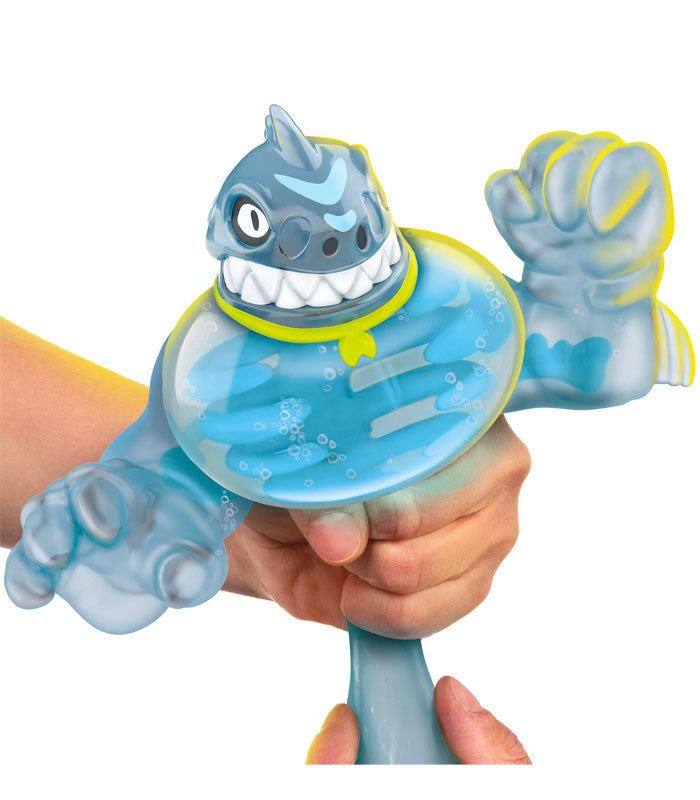 Goo Jit Zu Dino X-Ray Thrash action figure being stretched.