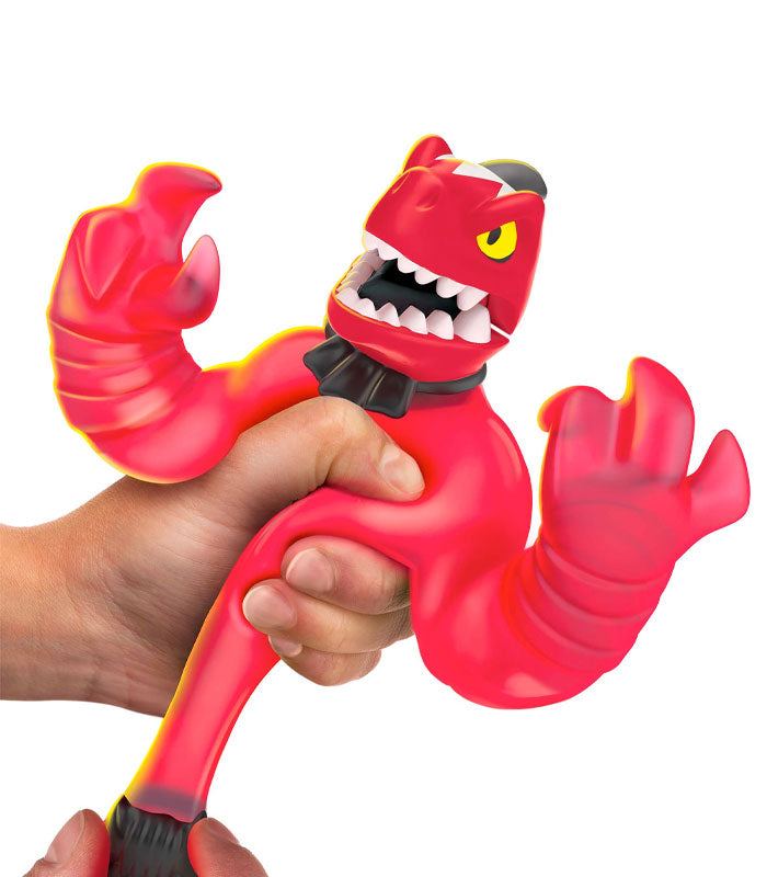 Goo Jit Zu Dino X-Ray Fossil Faceoff Thrash squeezing action figure.