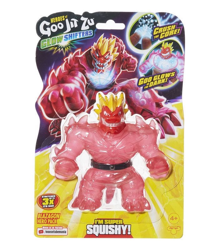 Heroes of Goo Jit Zu Glow Shifters Blazagon toy in packaging, featuring stretchable, squeezable, glow-in-the-dark dragon.