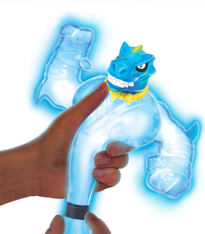 Goo Jit Zu Glow Shifters Tyro toy being stretched and squeezed, glowing blue in the dark.
