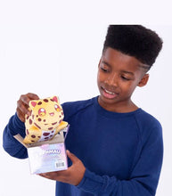 Load image into Gallery viewer, A child holding an Aphmau Mystery MeeMeows Surprise Plush.