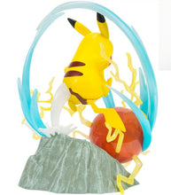 Load image into Gallery viewer, Pokemon Deluxe Pikachu Statue in dynamic battle pose with light-up Electro Ball and clouds.