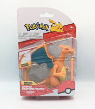 Load image into Gallery viewer, Charizard Pokémon Battle Figure in packaging with action fire blast feature.