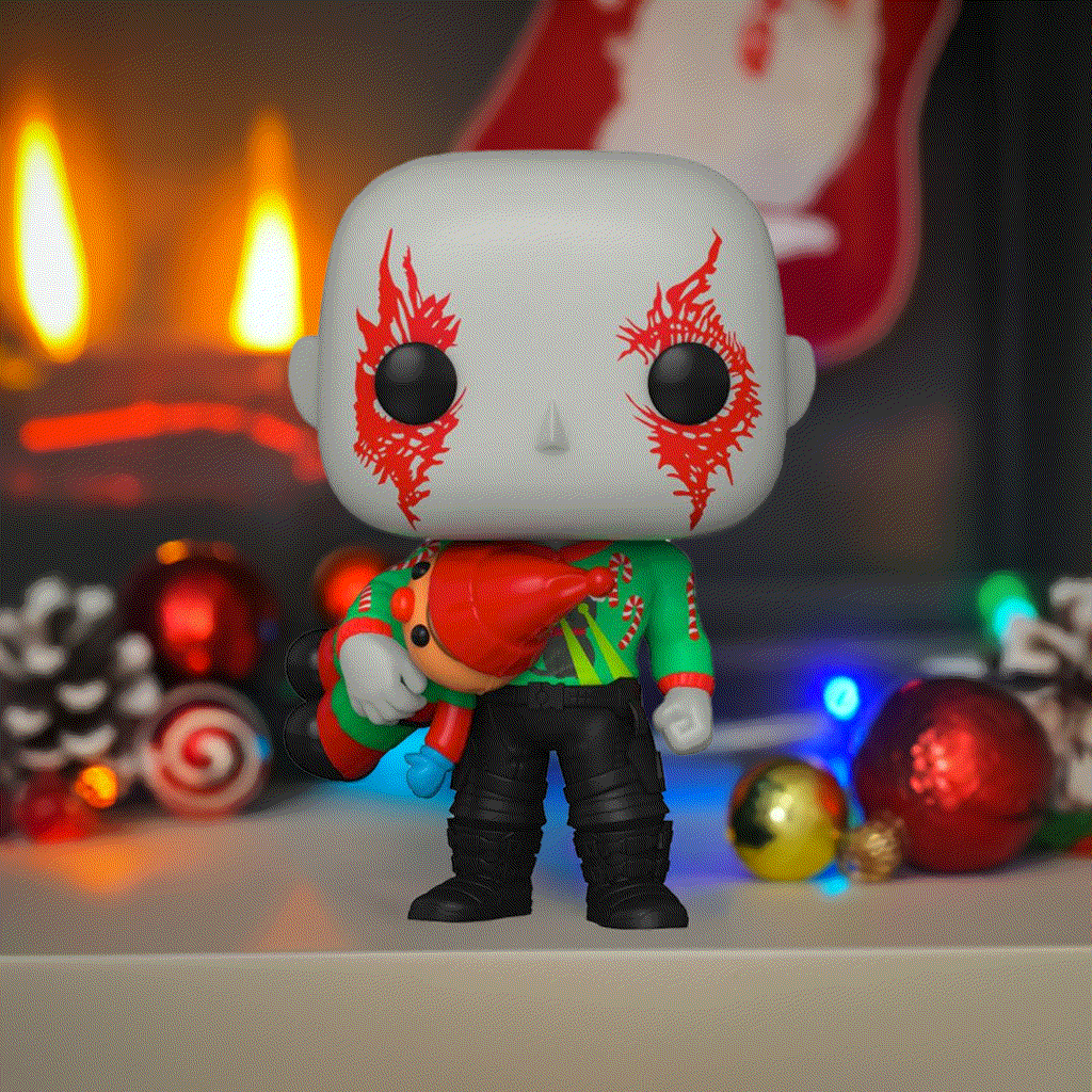 Holiday-themed Drax Pop! Vinyl figure holding a present with festive decor.
