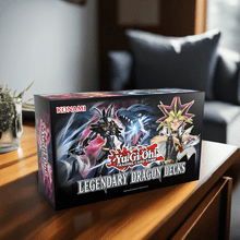 Load image into Gallery viewer, Yu-Gi-Oh! Legendary Dragon Decks Reprint Unlimited Edition box on a table with dragon artwork.

