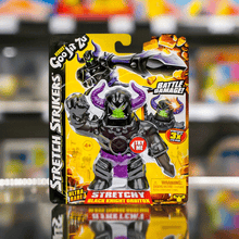 Load image into Gallery viewer, Heroes of Goo Jit Zu Stretch Strikers - Ultra Rare Black Knight Orbitox toy in packaging, featuring stretchy action and gooey filling.
