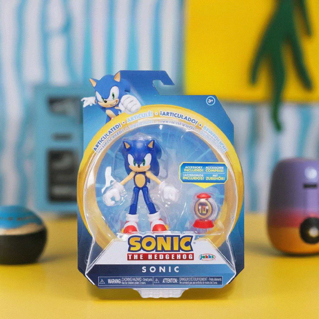 Hedgehog Sonic figure with collectible ring container in packaging.