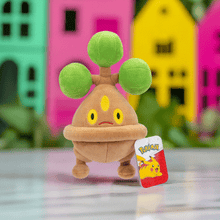 Load image into Gallery viewer, Pokemon 8 Inch Plush - Bonsly, soft replica with tree-like appearance, perfect for cuddling and display.
