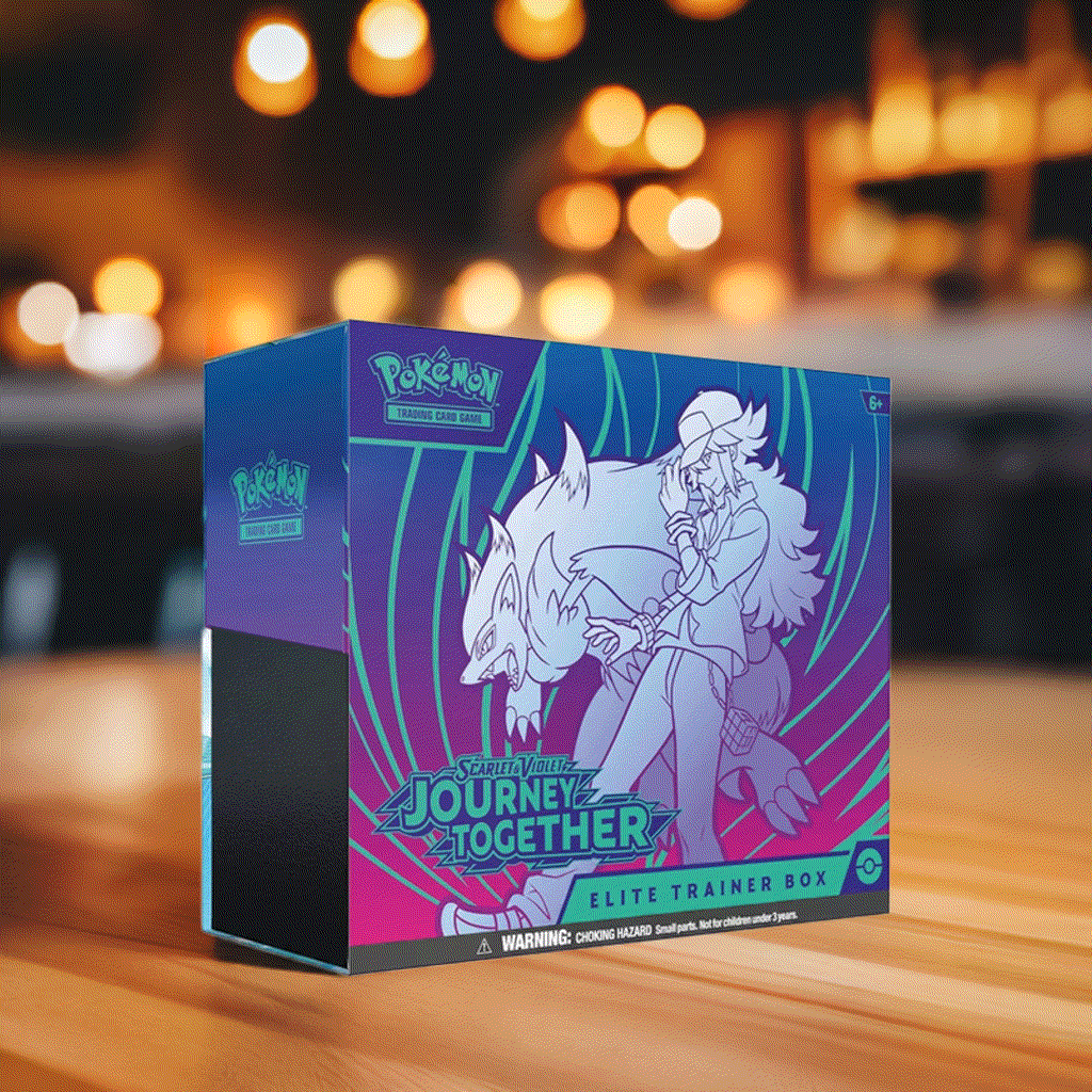 Pokemon TCG Journey Together Elite Trainer Box on wooden table, vibrant themed design.