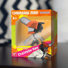 Load image into Gallery viewer, Chibi Masters Chainsaw Man figure in vibrant display box showcasing dynamic action pose with chainsaw head.
