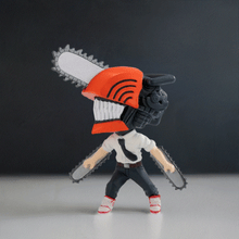 Load image into Gallery viewer, Chibi Masters Chainsaw Man figure in dynamic pose with chainsaw head.
