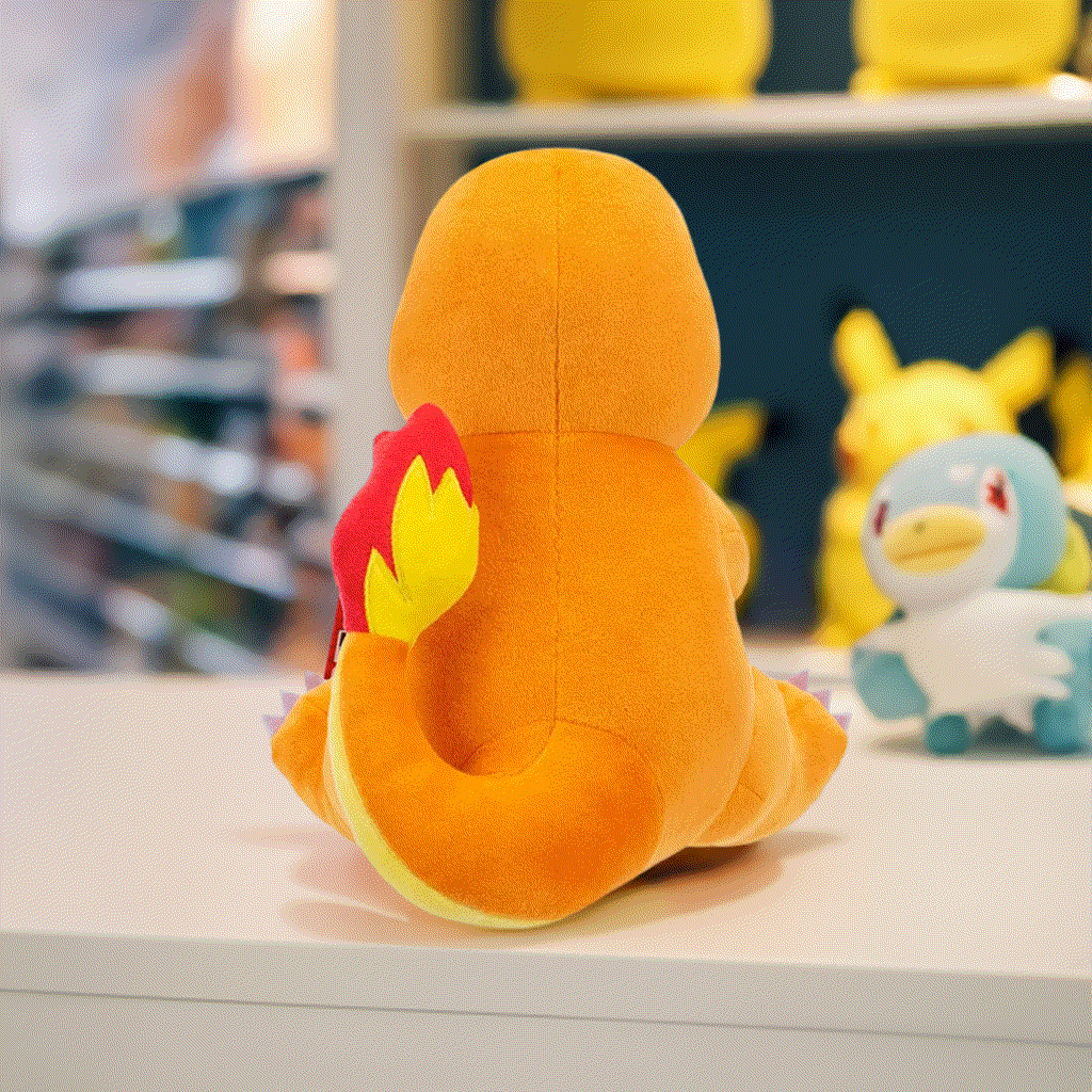 Pokemon 8 Inch Plush - Charmander Sitting on a display shelf.