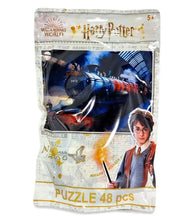Load image into Gallery viewer, Harry Potter Hogwarts Express 48 Piece Puzzle packaging with vibrant artwork of the iconic train and young Harry Potter.
