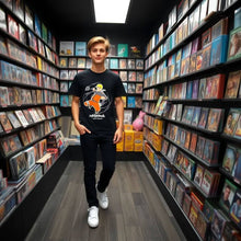 Load image into Gallery viewer, Naruto Shippuden Swirl T-Shirt XLarge featuring Naruto Uzumaki design in a vibrant store aisle.
