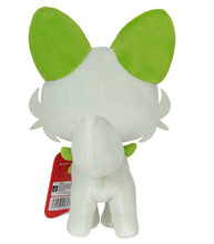 Load image into Gallery viewer, Pokemon 8&quot; Plush - Sprigatito with green ears and leafy tail, back view.
