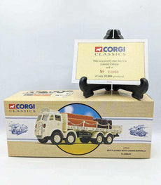 Corgi ERF Flatbed die-cast model with chains and barrels, includes certificate.