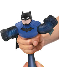 Load image into Gallery viewer, Stealth Armor Batman Goo Jit Zu toy being stretched and squeezed.
