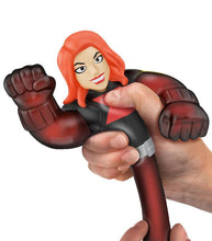 Load image into Gallery viewer, Goo Jit Zu Black Widow action figure being stretched by a hand.

