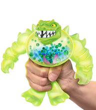 Load image into Gallery viewer, Heroes of Goo Jit Zu Goo Shifters - Rock Jaw toy being squeezed to reveal goo-filled core.
