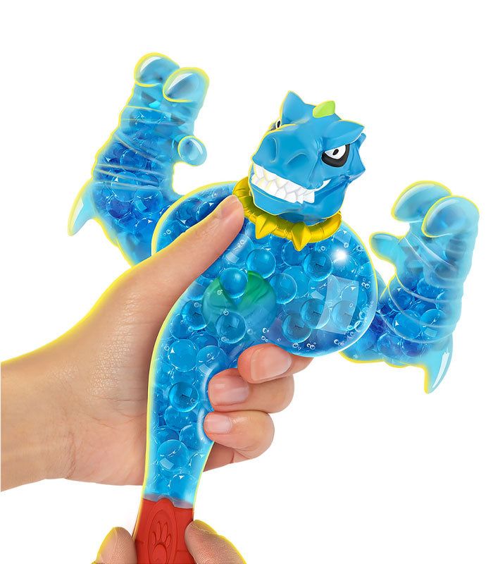 Goo Jit Zu Goo Shifters - Tyro stretchable action figure being squeezed.