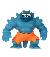 Load image into Gallery viewer, Goo Jit Zu Glow Shifters Versus Pack - Ultraglow Tyro action figure in orange shorts.
