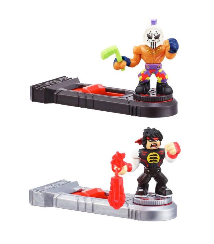 Akedo Ultimate Arcade Warriors Versus Pack - Slashshot VS Epic Chux action figures with unique weapons, ready for battle.