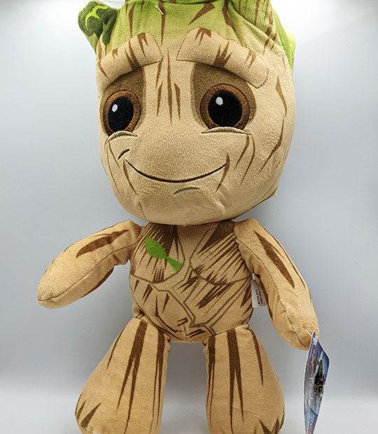 Baby Groot 12-inch plush toy with tree-like features and soft material.