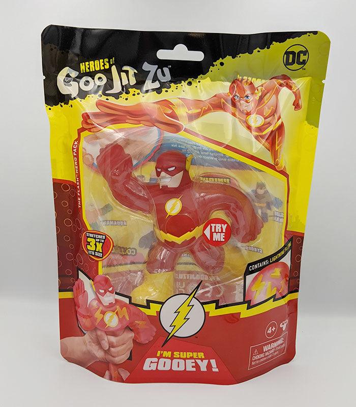 Heroes of Goo Jit Zu The Flash toy in packaging, featuring stretchy, gooey superhero action figure suitable for ages 4+.