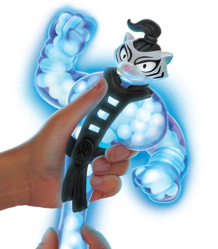 Goo Jit Zu Glow Shifters Bengal toy glowing in the dark, stretchy and filled with water beads.