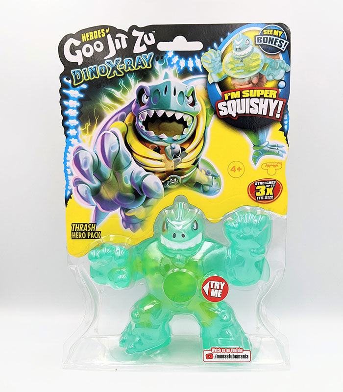 Heroes of Goo Jit Zu Dino X-Ray Thrash toy in packaging, showcasing stretchy, gooey design for ages 4 and up.