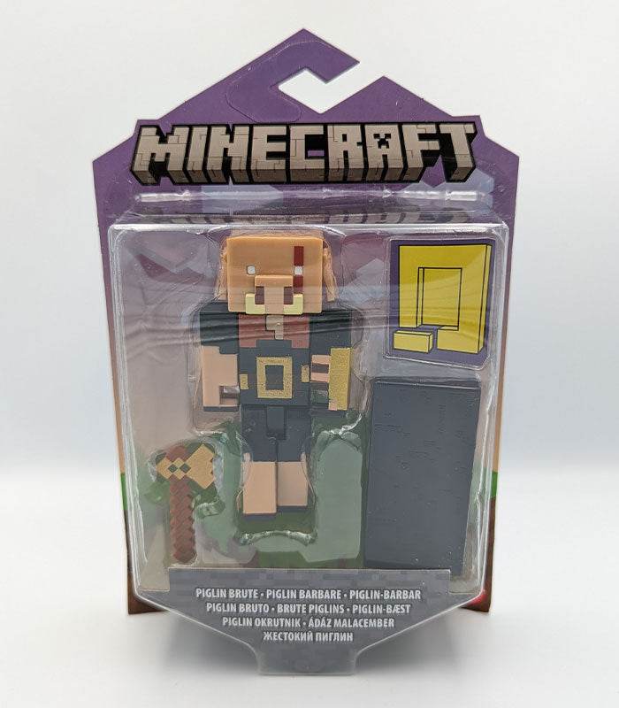 Minecraft Portal Action Figure Piglin Brute with accessories and movable parts in packaging.