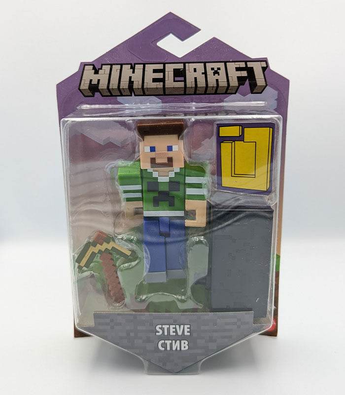 Minecraft Portal Action Figure - Steve Creeper Top in packaging with accessories and portal piece.