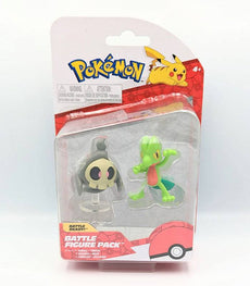 Duskull and Treecko Pokemon battle figures in packaging.