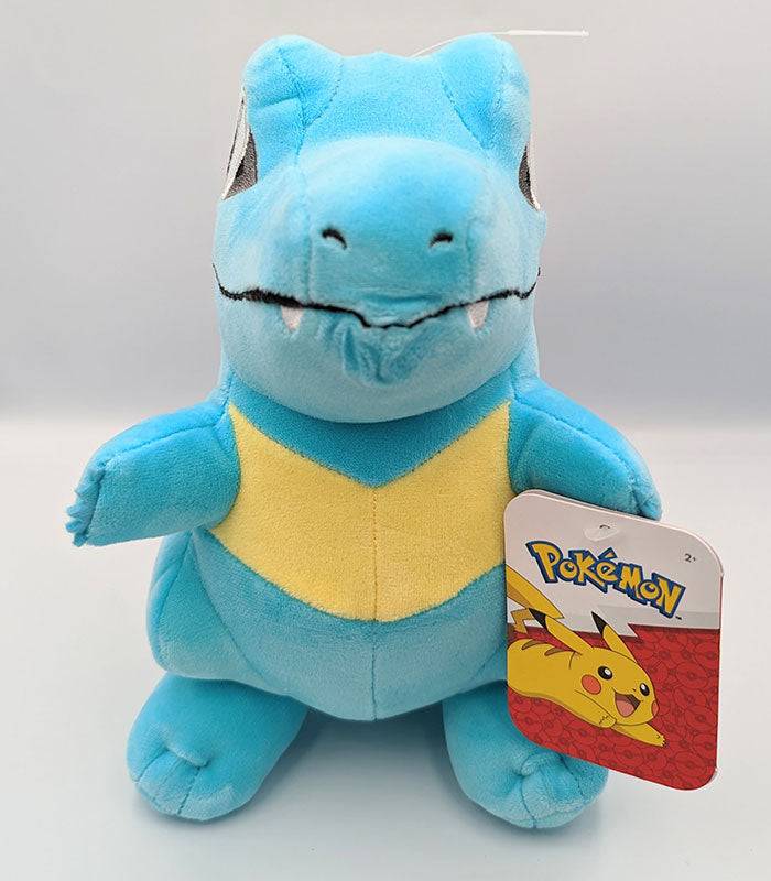 Totodile 8" plush Pokemon toy with blue skin and toothy grin.